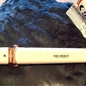 Elegant White and Gold Hair Styling Tool